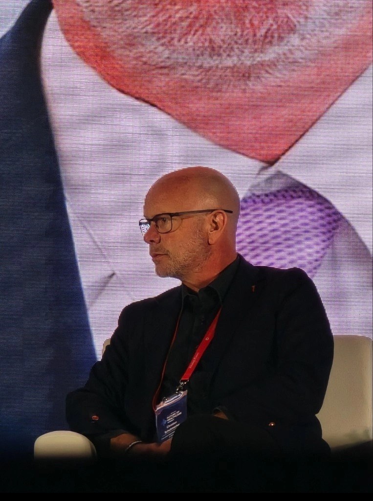 Christian Schuhmacher on a conference panel